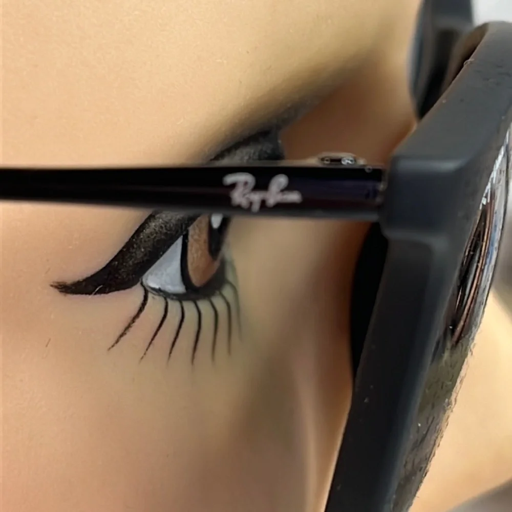 Ray-Ban Black Frame Polarized Sunglasses with Dark Gray Lenses